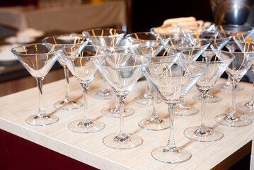 Clean empty martini glasses ready for service.