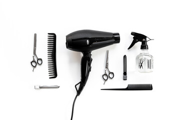 Set of combs, scissors and hair dryer, hairdresser tools set, top view
