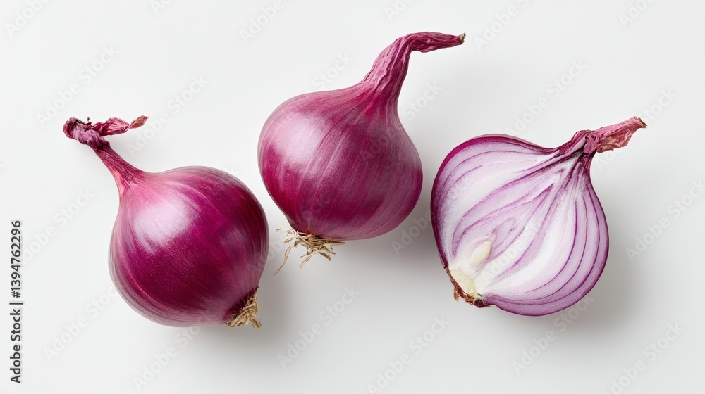 Poster three large onions are shown, one of which is cut in half. the onions are all different sizes and ar