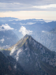 Sunrise in the mountains with deep valleys