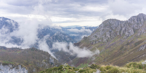 Panorama of a mountain valley on a cloudy morning 