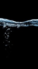 Liquid motion on dark background with air bubbles creating a dynamic and refreshing scene of pure water