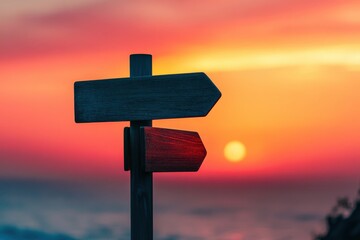 Wooden direction signs point towards opposite directions at sunset