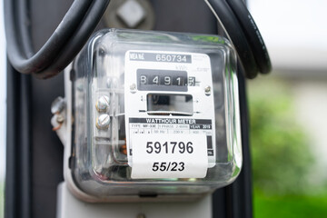 Electric measuring power meter for energy cost at home and office.