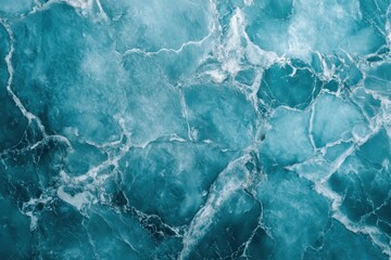 Obraz premium Close up of a textured teal and white marbled surface