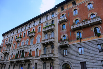 Old residential buildings along via Mascheroni in Milan, Italy