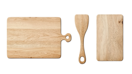 A set of wooden kitchen utensils including a chopping board and serving spoon arranged on a plain white background with copy space for product placement or recipe presentation