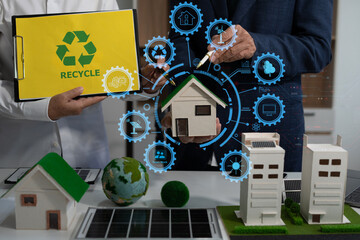 Two colleagues discussing data sustainable development with renewable energy solutions, ecology...