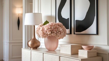 Stylish hallway decor with a console table, beautiful hydrangea flowers, and a lamp near a white wall