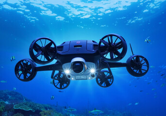 Underwater drone is hovering over a coral reef, capturing the beauty of marine life with its integrated camera and bright lights