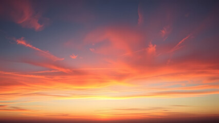 Fototapeta premium Dramatic red sunset sky with clouds painted the evening landscape in beautiful colors