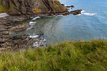 Dunnottar Castle rises in dramatic ruins atop a cliff overlooking the North Sea. Its breathtaking...