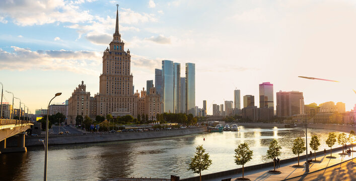 MOSCOW, RUSSIA - July 26, 2024: view of the Radisson Collection Hotel Moscow and Moscow City, Taras Shevchenko Embankment and Krasnopresnenskaya Embankment at sunset - panorama