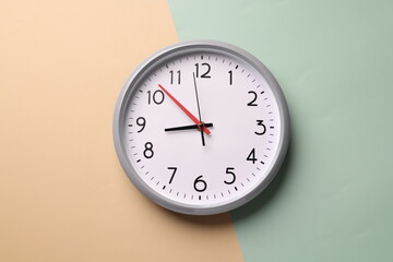Close-up of a wall clock. The concept of time and work time is valuable for life, Alarm clock...
