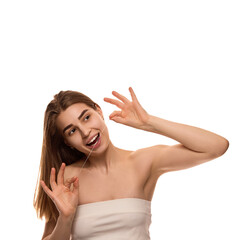 Fototapeta premium Portrait of young woman open mouth to clean teeth with white floss against white background. Hygiene. Concept of youth and natural beauty, cosmetology treatment, cosmetic, spa. Ad
