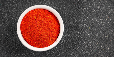Ground hot red pepper cayenne pepper paprika spice appetizer vegetables dish organic product fresh...