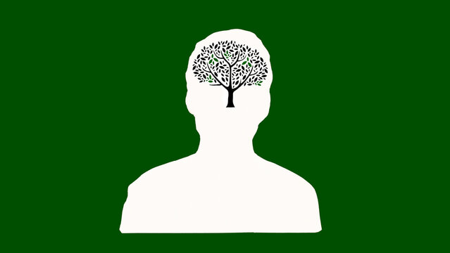 Human silhouette on green background with tree in his head symbolizing love and kindness for nature. Ecology concept.