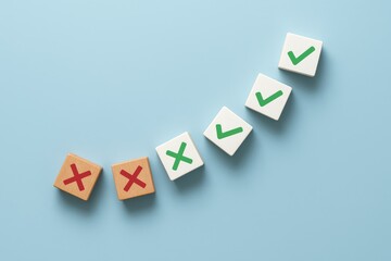Obraz premium Checkmarks and Cross Marks on a Soft Blue Background Representing Decisions, Choices, and Assessments in a Visual Design