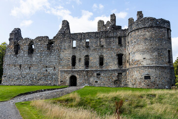 The ruins of Ruthven Barracks overlook the valley near Kingussie, Scotland. A hauntingly beautiful site rich in military history, set among green hills and dramatic Highland skies