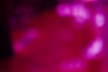 Abstract magenta background with blurred light effect, party theme
