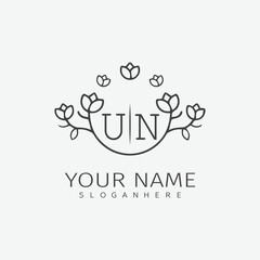 Obraz premium initial monogram wedding with creative circle line flower.