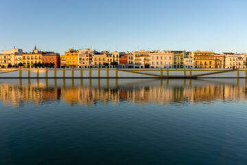 Obraz premium Views to Triana neighborhood at Seville. Triana barrio of Seville facades, Andalusia, Sevilla, Spain