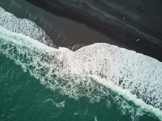 Aerial scenic view of Reynisfjara black sand beach near Vik in Southern Iceland.