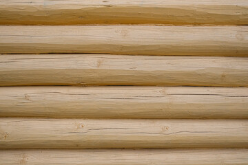 Fototapeta premium Wooden Log Wall Texture for Backgrounds. Close-up.