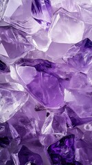 Close-up shot of clustered purple amethyst gemstones reflecting light in a glossy crystalline texture
