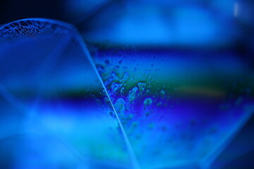 Blue liquid texture in macro, bright fluid background, smooth movement, molecular structure