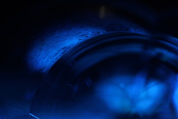 Blue liquid structure in macro, bright fluid background, smooth movement, molecular structure, dark...