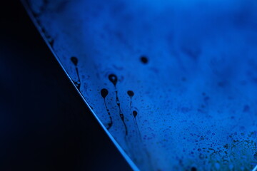 Blue liquid structure in macro, bright fluid background, smooth movement, molecular structure, dark...