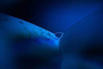 Blue liquid structure in macro, bright fluid background, smooth movement, molecular structure, dark...