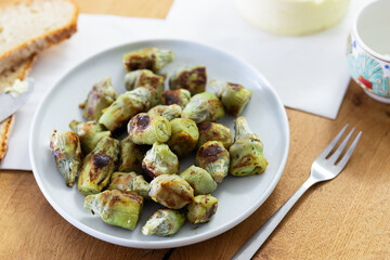fried artichoke hearts on a plate