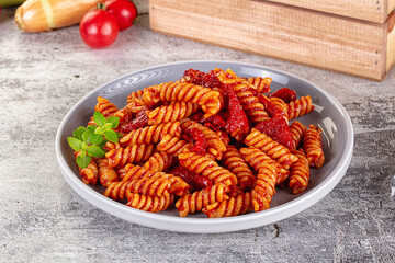 Italian fusilli pasta with tomatoes