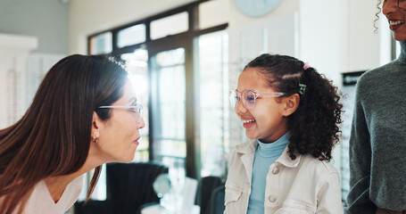 Eyewear, optometry or vision with child and woman in hospital for appointment, checkup and eye care. Frame, glasses or prescription with girl and optometrist in clinic for ophthalmology consulting