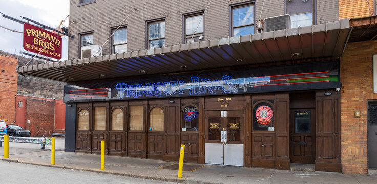 PITTSBURGH, PA &ndash; A street-level view of the iconic Primanti Bros. restaurant, known for its signature sandwiches topped with fries and coleslaw. Located in the heart of Pittsburgh, this legendary eate