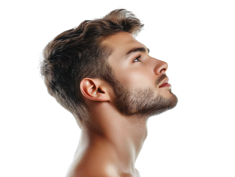 Close-up side profile of a handsome young man with well-groomed beard and clean haircut looking up, isolated on transparent background
