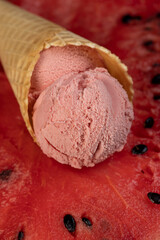 ice cream and red ripe watermelon, a waffle cup with watermelon-flavored ice cream and red fresh watermelon