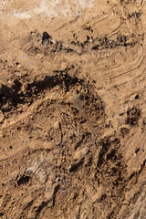 a work site where is construction of a new road for cars, excavated pits during construction