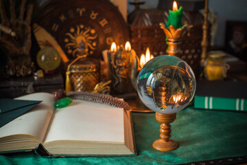 A beautifully arranged witch altar scene featuring glowing candles, ancient tarot cards, a crystal ball, and magical ritual tools. This atmospheric composition evokes the essence of mystical energy, s
