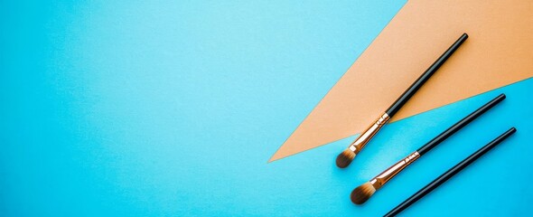 The layout of cosmetic makeup accessories features a fashionably creative and minimal set with a trendy design clutch and lipstick brushes in a colorful pastel art concept style