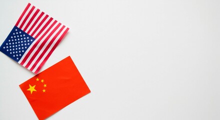 Two national flags on a white background, symbolizing international relations and trade. Shows the flags of the United States and China.