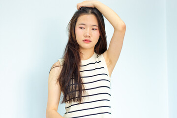 Closeup portrait of female model holding messy hair in hands, Combing with brush and pulls long hair, Daily preparation for looking nice, Long Disheveled Hair, Holding Messy Hair