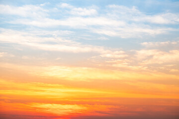 Beautiful , luxury soft gradient orange gold clouds and sunlight on the blue sky perfect for the background, take in evening,Twilight, Large size, high definition landscape photo