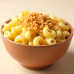 A creamy, cheesy bowl of macaroni and cheese with crispy breadcrumbs on top.