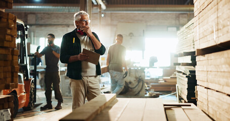 Carpenter, notes and thinking of wood in workshop for timber inspection, quality control and stock checklist. Manufacturing industry, mature man and clipboard for inventory management or supply chain