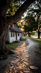 Obraz premium Historic Cobblestone Path Through a Charming Village at Sunset Scenic View of Nature and Architecture