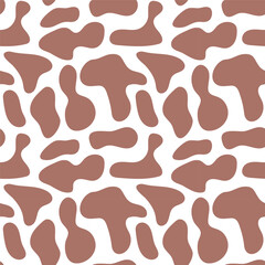 Abstract seamless pattern with brown blurred spots on isolated white background. Animal print Vector design for textile, packaging, cover artwork