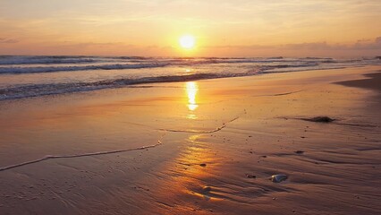 Fototapeta premium Sunrise Illumination on Textured Coastal Sand